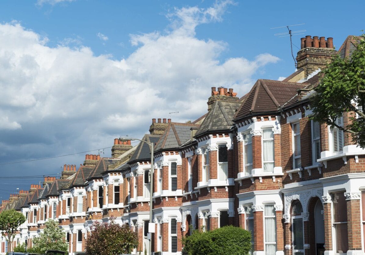 UK terraced housing. Clapham, London. Real estate on urban street in England. Terrace of houses in United Kingdom